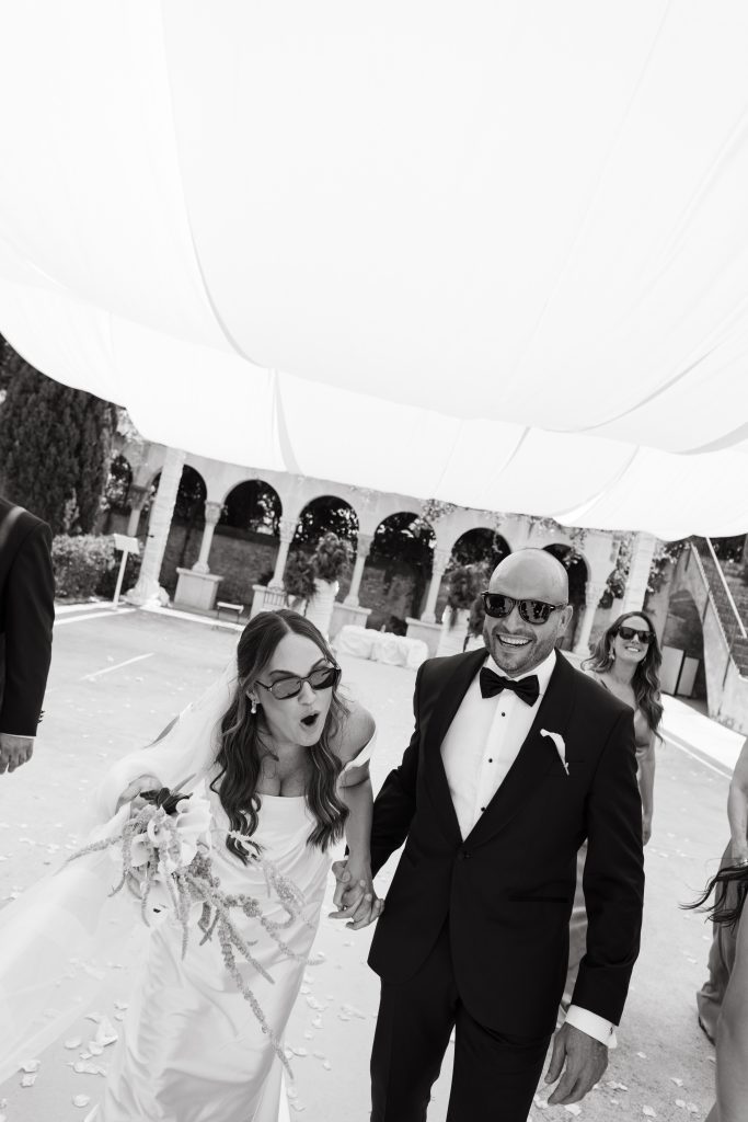 Editorial groom portrait in a tailored tuxedo at an exclusive Italian wedding